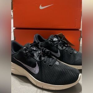 Nike Men's Black Running Shoes with Light Purple Swoosh